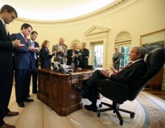 Mike Emanuel, second from left, with reporters in the Oval Office with President Bush