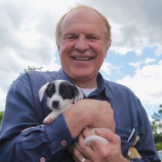 Senator Raymond Lesniak with a rescue puppy